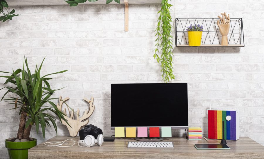 Desk with keyboard and other items in modern office. Home workplace concept. freelance jobs